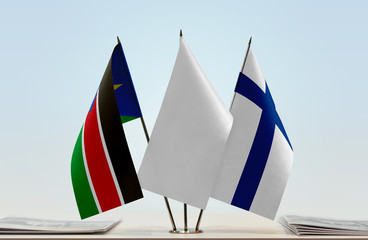 Flags of South Sudan and Finland with a white flag in the middle