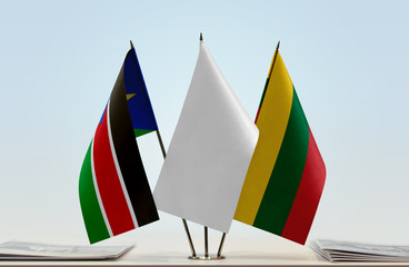 Flags of South Sudan and Lithuania with a white flag in the middle