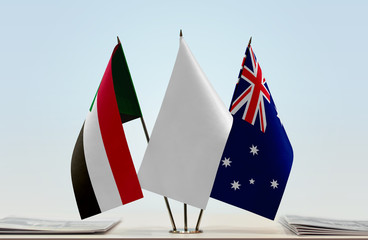 Flags of Sudan and Australia with a white flag in the middle