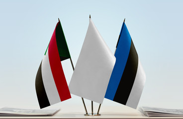 Flags of Sudan and Estonia with a white flag in the middle