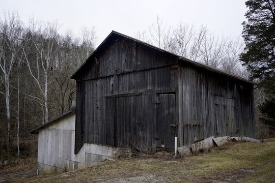 Abandoned old barns in the country on farms