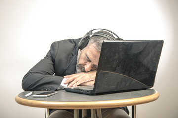 Elderly business man fallen asleep