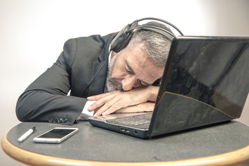 Elderly business man fallen asleep