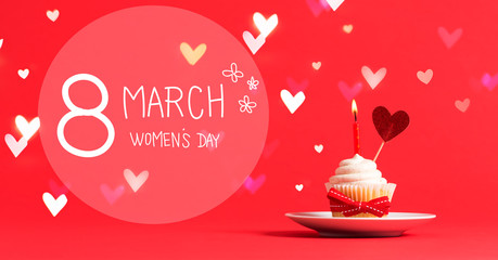 Women's Day message with cupcake and heart ornament