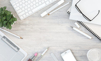 Office desk workspace with computer keyboard, stationery set, smartphone on wooden table. Top view. Flat lay design with copy space. Business desk, back to school, office work concept. 3D