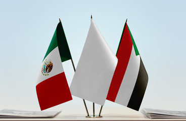Flags of Mexico and Sudan with a white flag in the middle