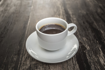 black coffee on wood table