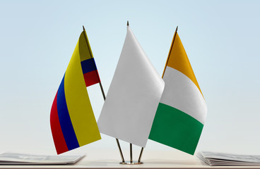 Flags of Colombia and Ivory Coast with a white flag in the middle