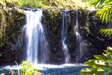 Gordijnen Triple waterfall and blue pool found along the legendary road to Hana on the island of Maui, Hawaii © Martha Marks
