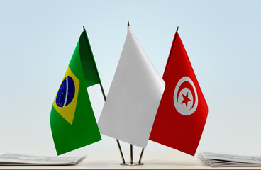 Flags of Brazil and Tunisia with a white flag in the middle