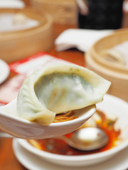  Chinese steamed dumpling in spoon