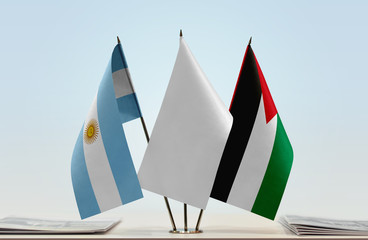 Flags of Argentina and Palestine with a white flag in the middle