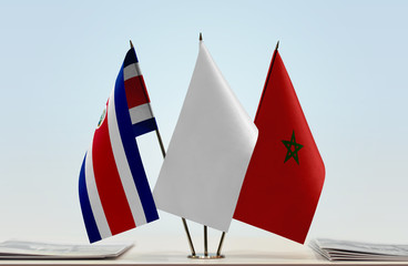 Flags of Costa Rica and Morocco with a white flag in the middle