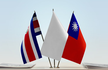 Flags of Costa Rica and Taiwan with a white flag in the middle