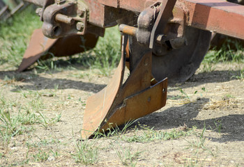 Plow on trailer for tractor. Plow for plowing soil. Trailer Hitch for tractors and combines. Trailers for agricultural machinery.