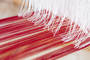 thai silk on the loom. thai silk handmade