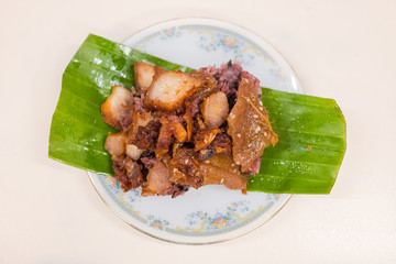 fried pork with black sticky rice,Thai food