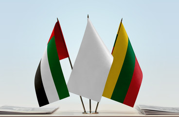 Flags of UAE and Lithuania with a white flag in the middle