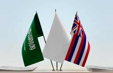 Flags of Saudi Arabia and Hawaii with a white flag in the middle