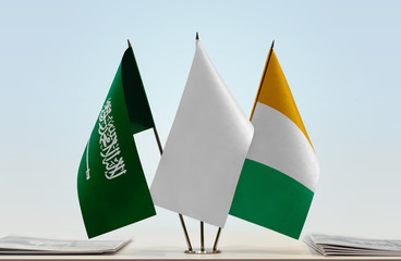 Flags of Saudi Arabia and Ivory Coast with a white flag in the middle