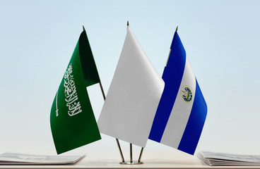 Flags of Saudi Arabia and El Salvador with a white flag in the middle