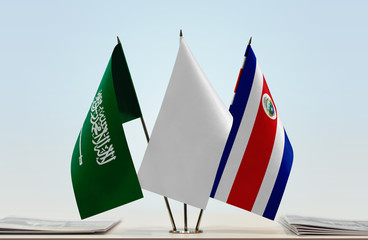 Flags of Saudi Arabia and Costa Rica with a white flag in the middle