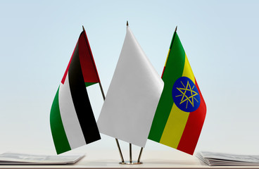 Flags of Palestine and Ethiopia with a white flag in the middle