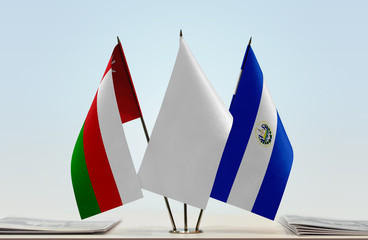 Flags of Oman and El Salvador with a white flag in the middle