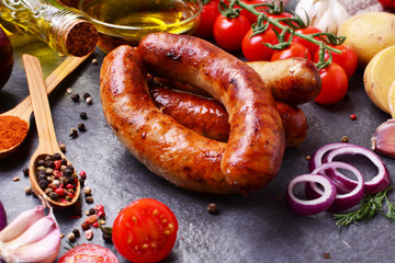 Pork sausages with spices and vegetables