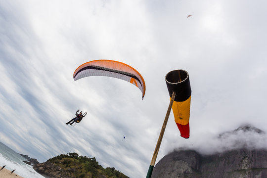 Hang Gliders In Pedra Da Gavea On A Cloudy Day