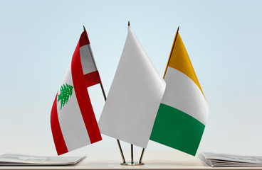 Flags of Lebanon and Ivory Coast with a white flag in the middle
