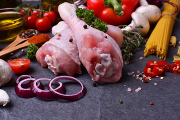 Chicken legs with spices and vegetables