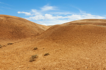 Red earth and blue sky