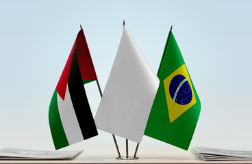 Flags of Jordan and Brazil with a white flag in the middle
