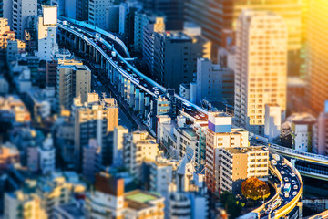 Asia Business concept for real estate and corporate construction - Tokyo Metropolitan Expressway junction in Roppongi Hill, Tokyo, Japan. Miniature Tilt-shift effect