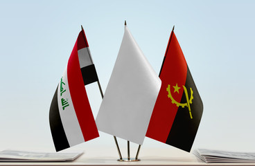 Flags of Iraq and Angola with a white flag in the middle