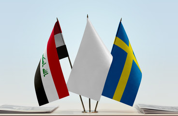 Flags of Iraq and Sweden with a white flag in the middle