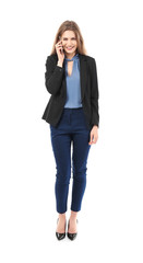 Fototapeta premium Beautiful young woman in elegant suit talking by mobile phone on white background