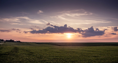 Fototapeta na wymiar sunrise in field, beginning of new day