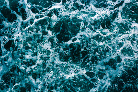 Abstract light blue background, sea waves, bulbs and foam, pattern © Bogdan