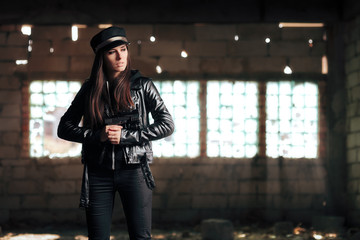 Female Police Officer Holding Gun During Stakeout
