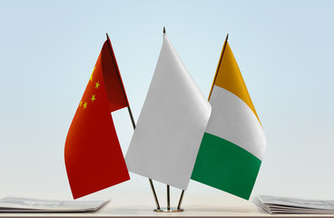 Flags of China and Ivory Coast with a white flag in the middle