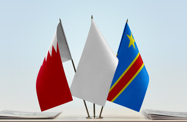 Flags of Bahrain and Democratic Republic of the Congo (DRC, DROC, Congo-Kinshasa) with a white flag in the middle