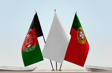 Flags of Afghanistan and Portugal with a white flag in the middle