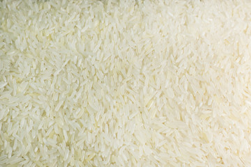 rice grain  on wood table image for background.