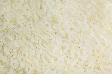rice grain  on wood table image for background.