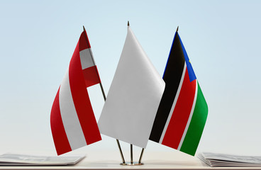 Flags of Austria and South Sudan with a white flag in the middle