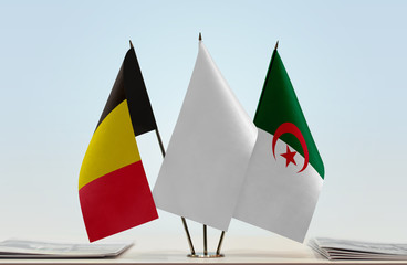 Flags of Belgium and Algeria with a white flag in the middle