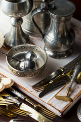 Old silver dishes with accessories for the kitchen