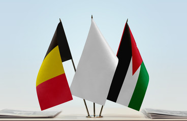 Flags of Belgium and Jordan with a white flag in the middle